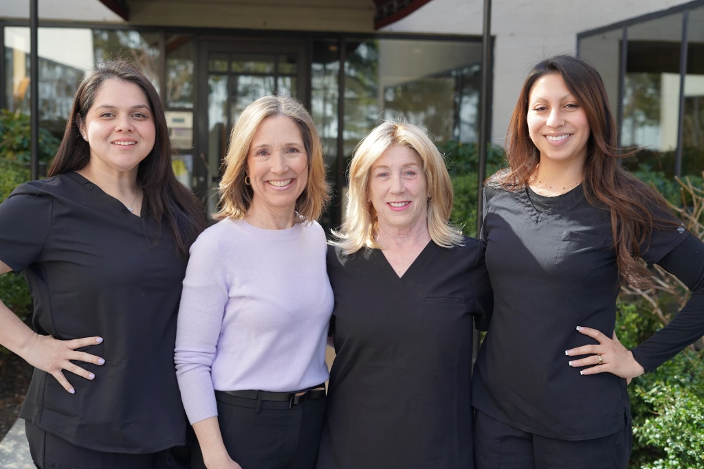 Dr. Michelle Cartier and her Certified Dental Assistant Staff